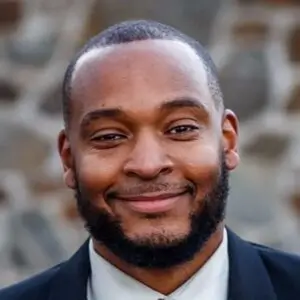 Professional headshot of Andre McDonald