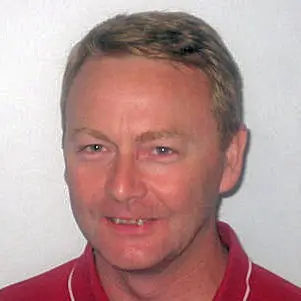 Professional headshot of John Harrickey